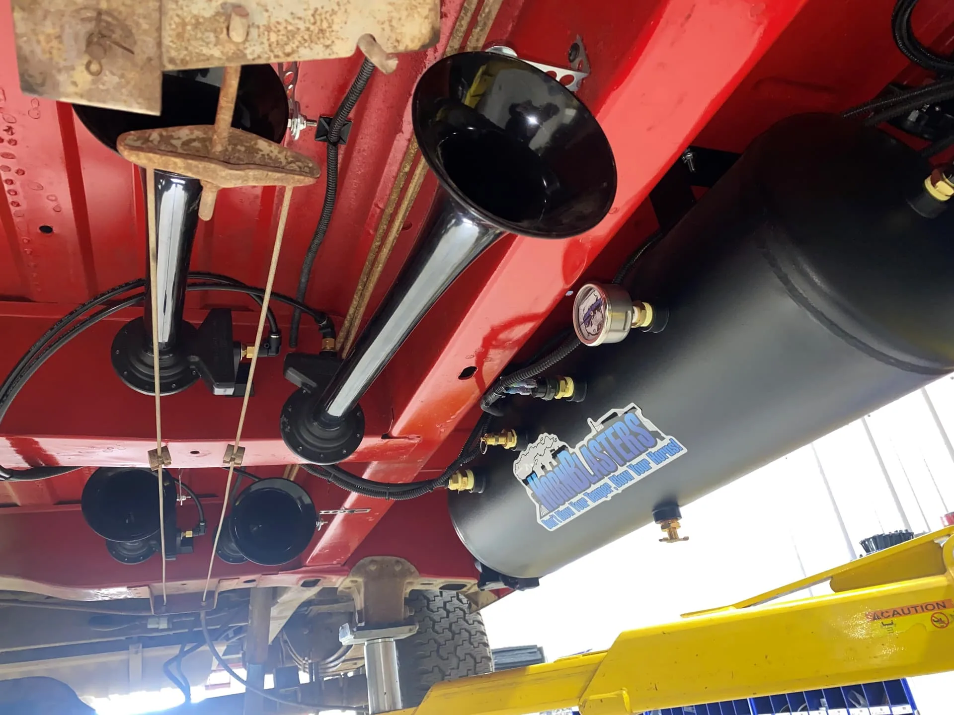 Exterior three-quarter view of Steve's 1970 Ford Econoline E200 with HornBlasters Conductor's Special 844 Nightmare Edition train horn featured customer install gallery photo 1