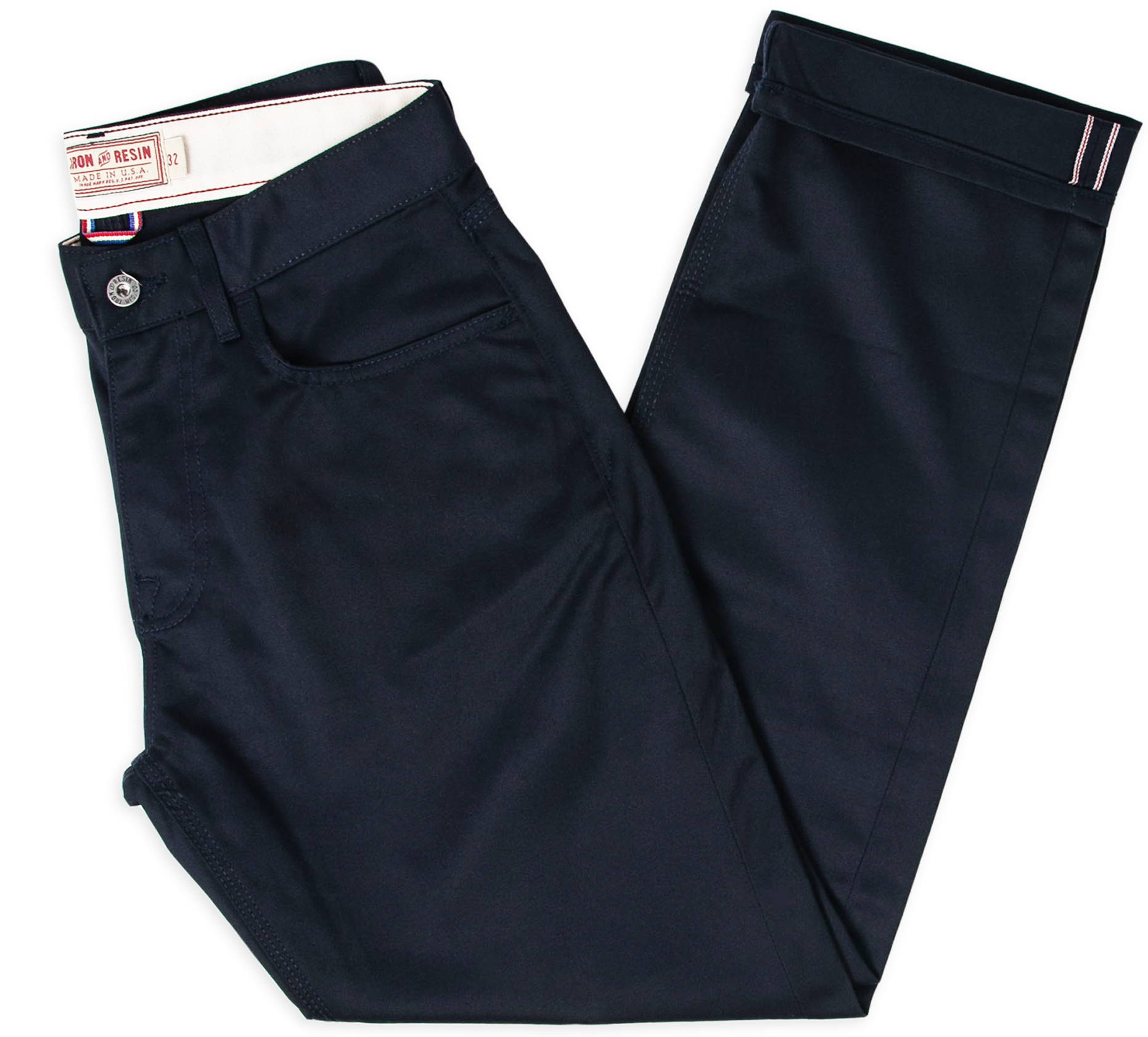 Iron & Resin Tradesman Pant in Navy Folded with Selvedge Twill Detail