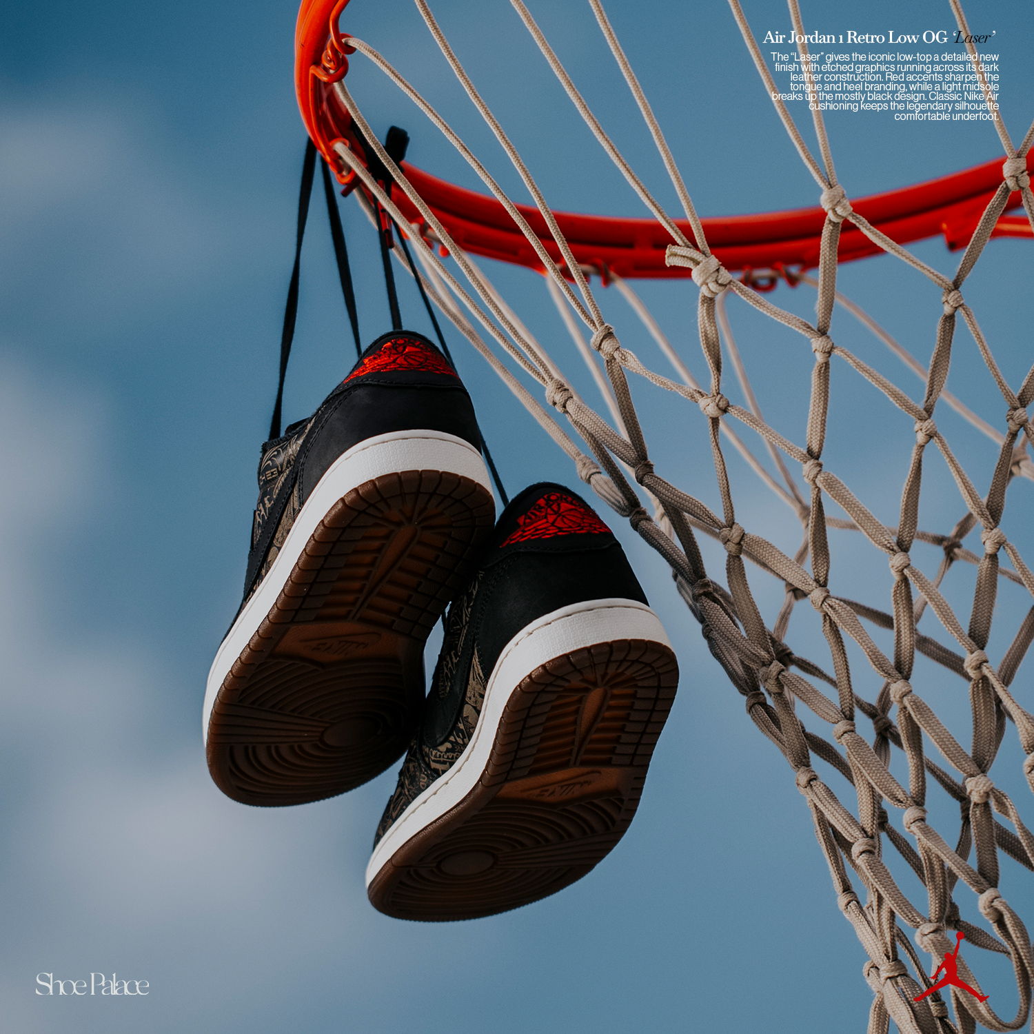 Shoes hanging from a basketball hoop against a blue sky.