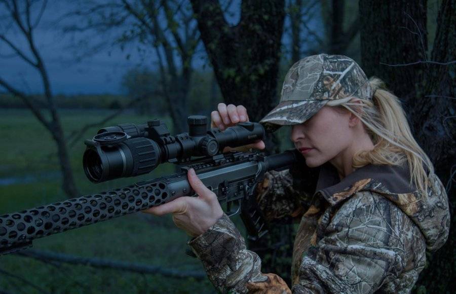 woman hunting with riflescope when faraday rifle case not in use