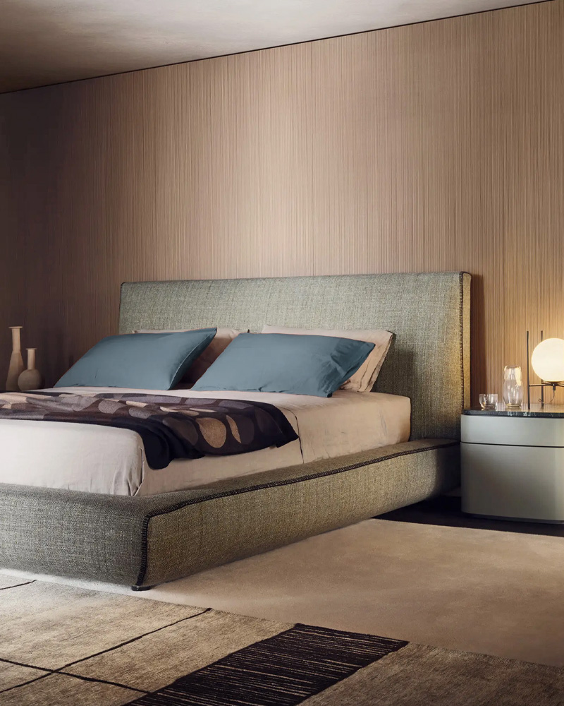 Modern Lema bed with a minimalist design, featuring a low profile and soft bedding.