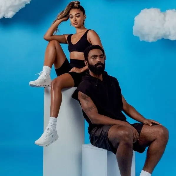 male and female models wearing on cloudnova sneakers in the sky