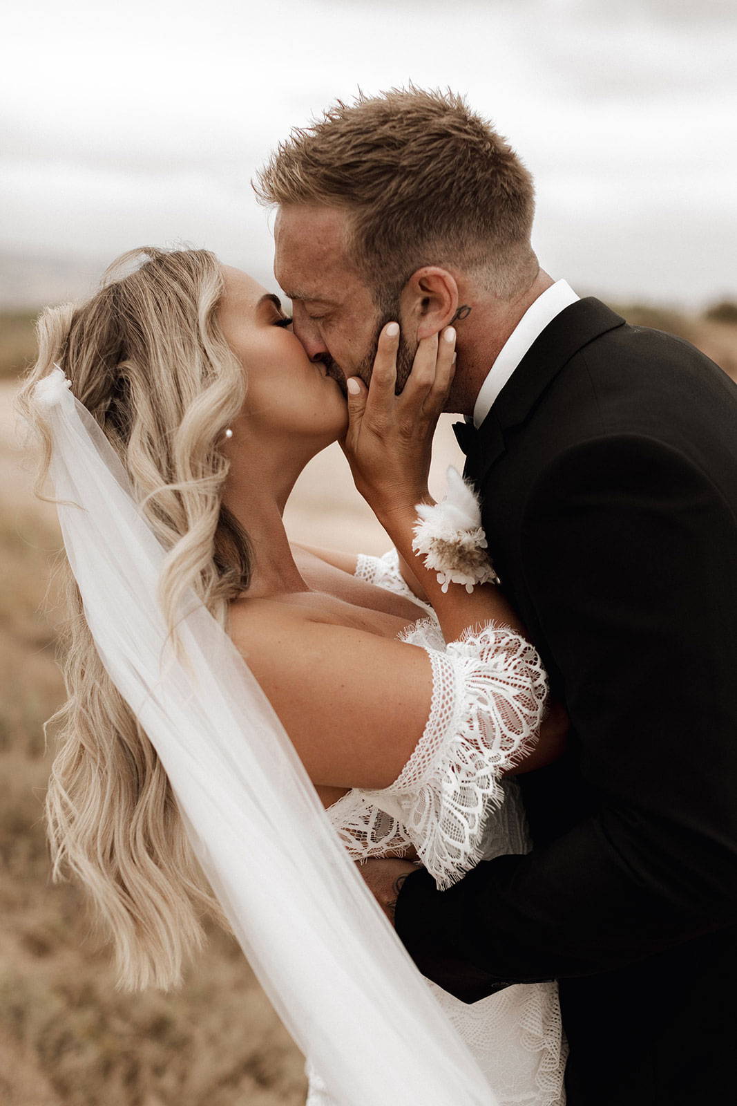 Bride and groom sharing a kiss