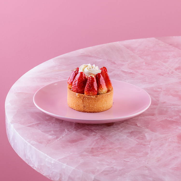 Mini strawberry tart with fresh fruits and creme patisserie and cream