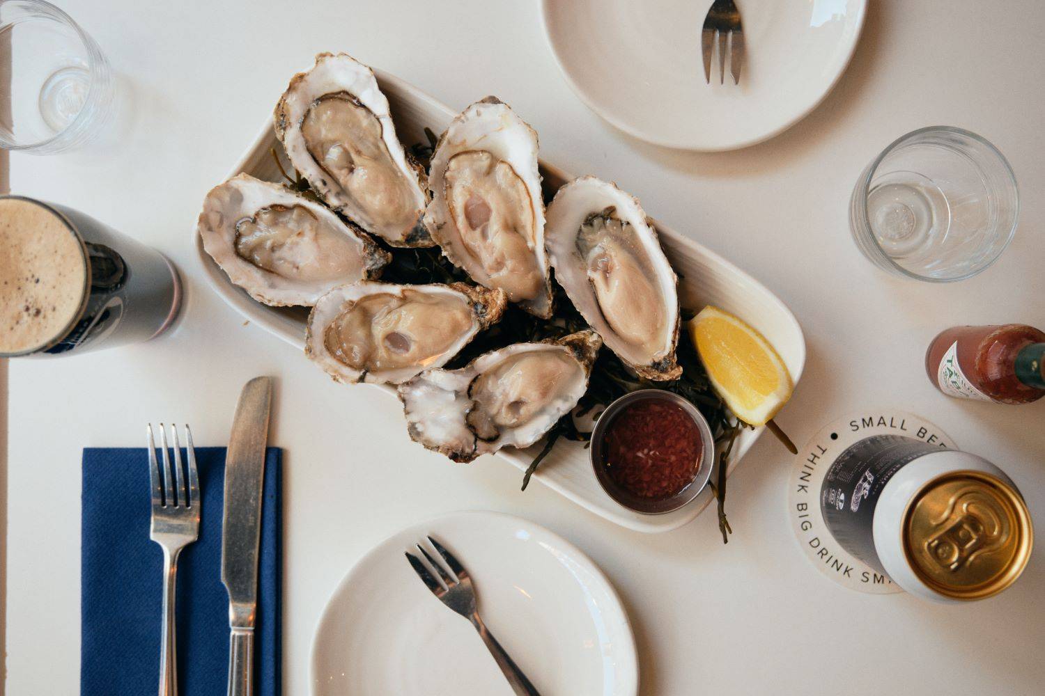 A plate of oysters and a pint of Stout beer