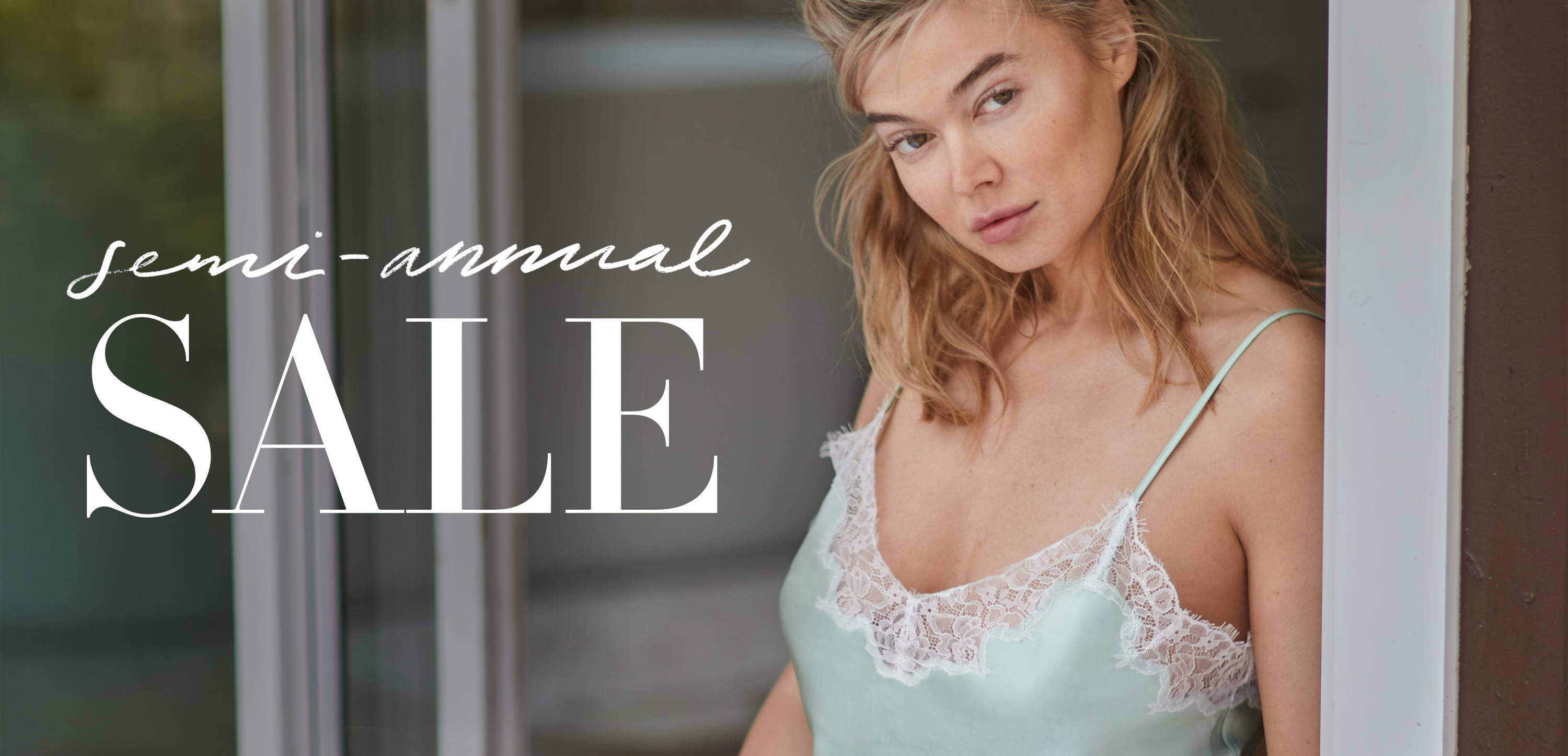 Female model wearing the Journelle Charlotte Camisole and Tap Short
