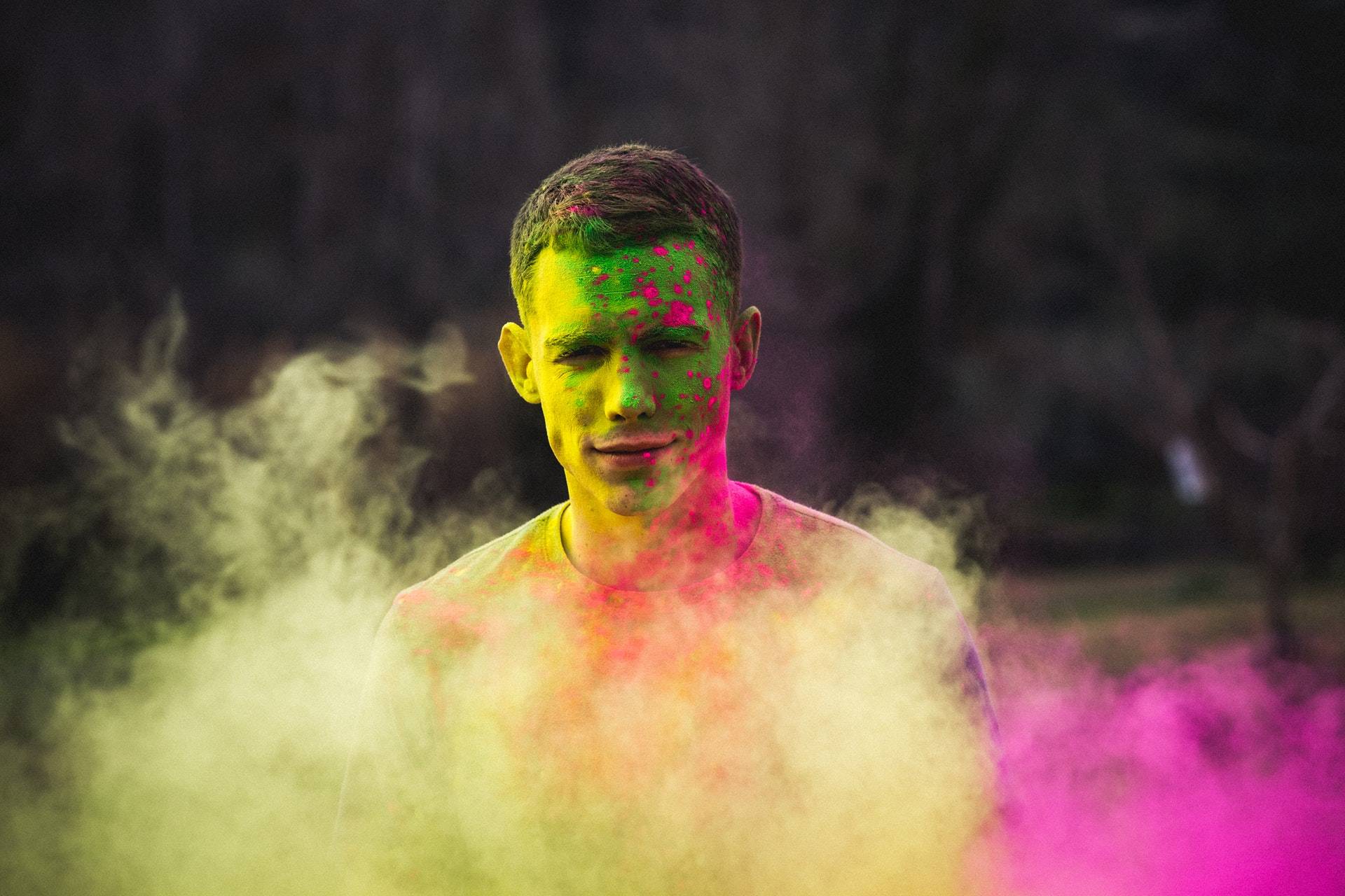 Man in colors at Holi festival in Goa India