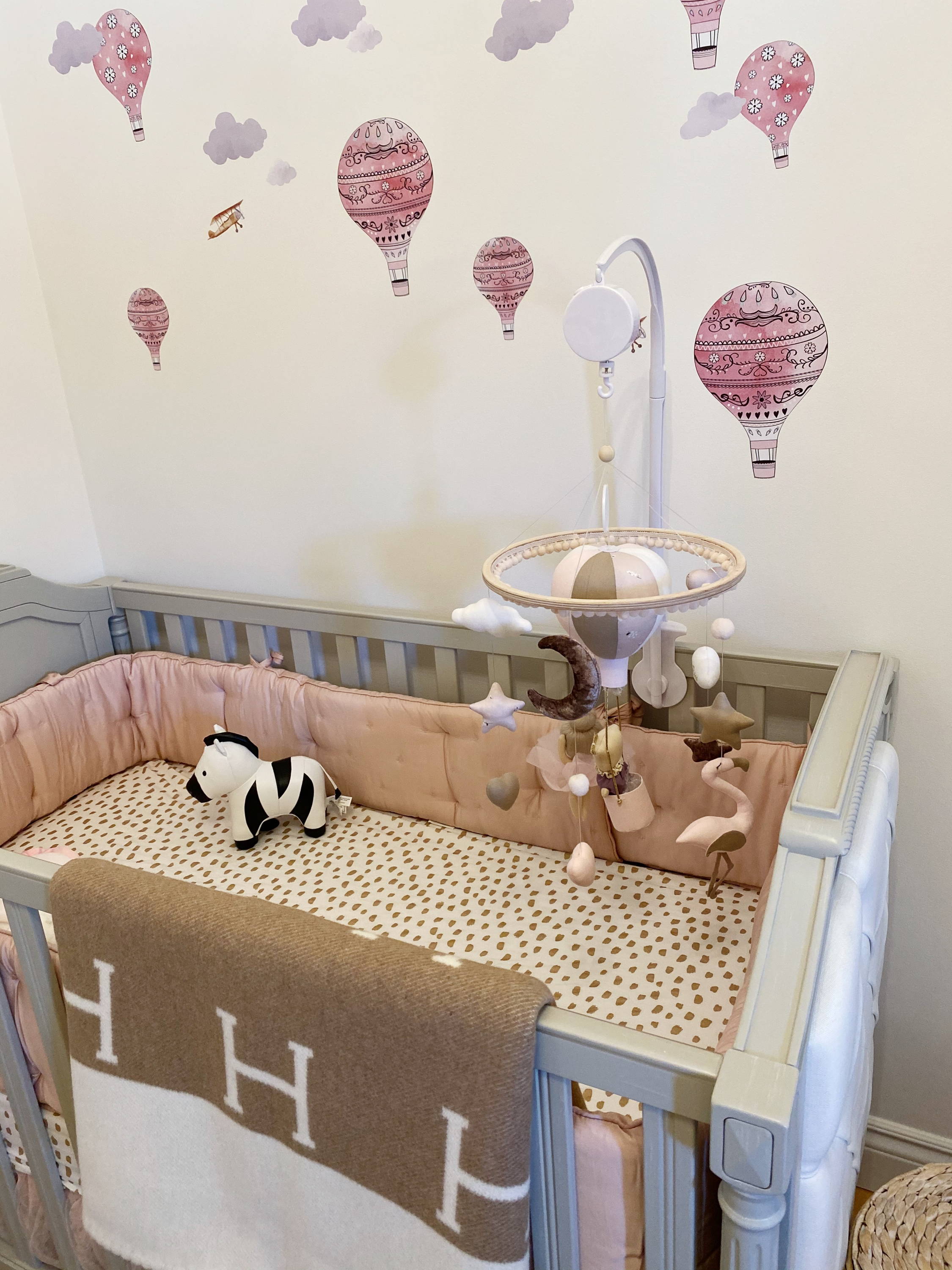 blythe crib from pottery barn kids in a nursery with hermes avalon blanket