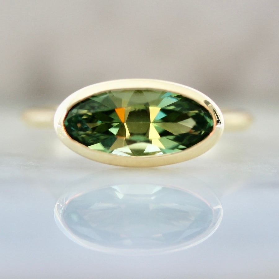 oval cut green tourmaline ring