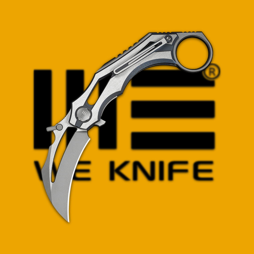 A silver knife with a curved blade on an orange background.