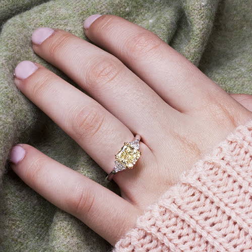 three stone yellow diamond engagement ring