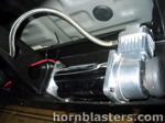Chrome air compressor finned aluminum head braided leader hose red black wiring frame rail Lance's 1999 Tundra Shocker XL onboard air gallery photo 4