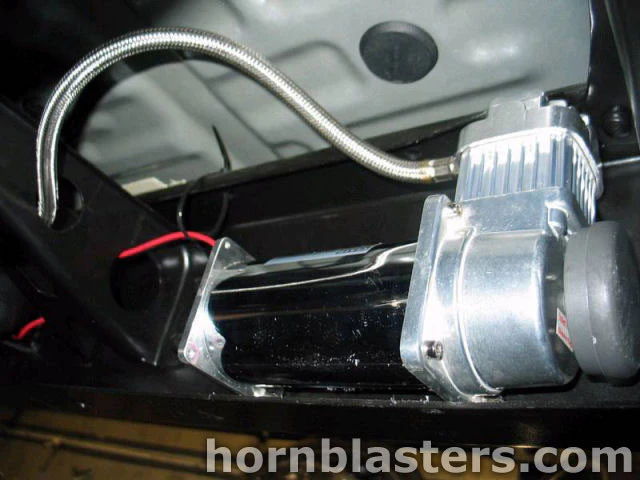 Chrome air compressor finned aluminum head braided leader hose red black wiring frame rail Lance's 1999 Tundra Shocker XL onboard air gallery photo 4