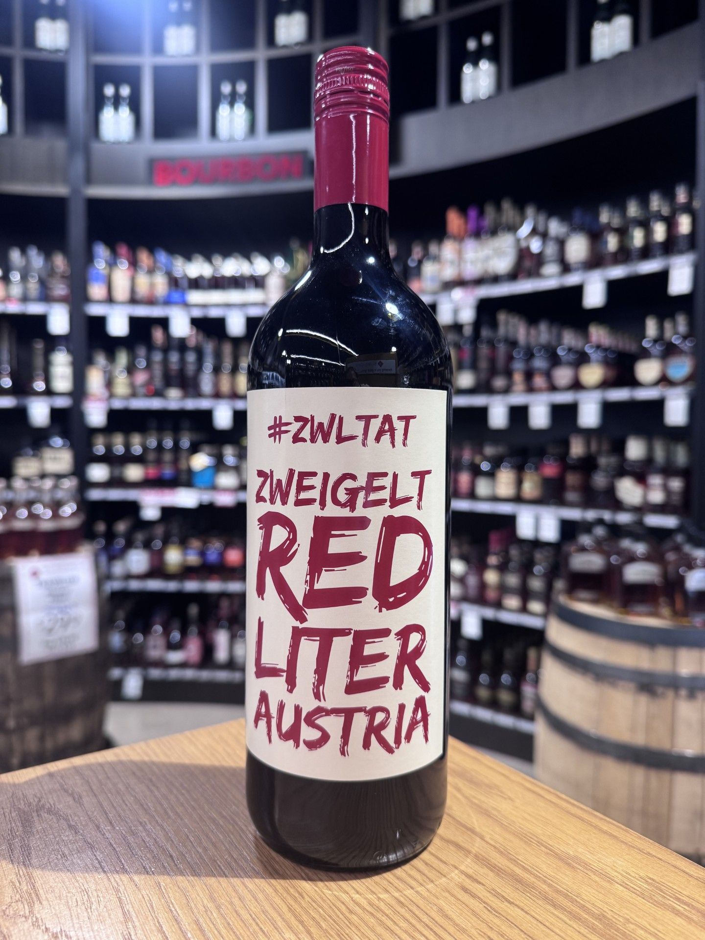 A bottle of Zweigelt red wine from Austria on a display.