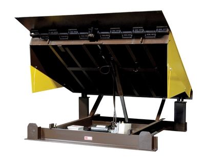 Hydraulic lift with a yellow safety cover in raised position.