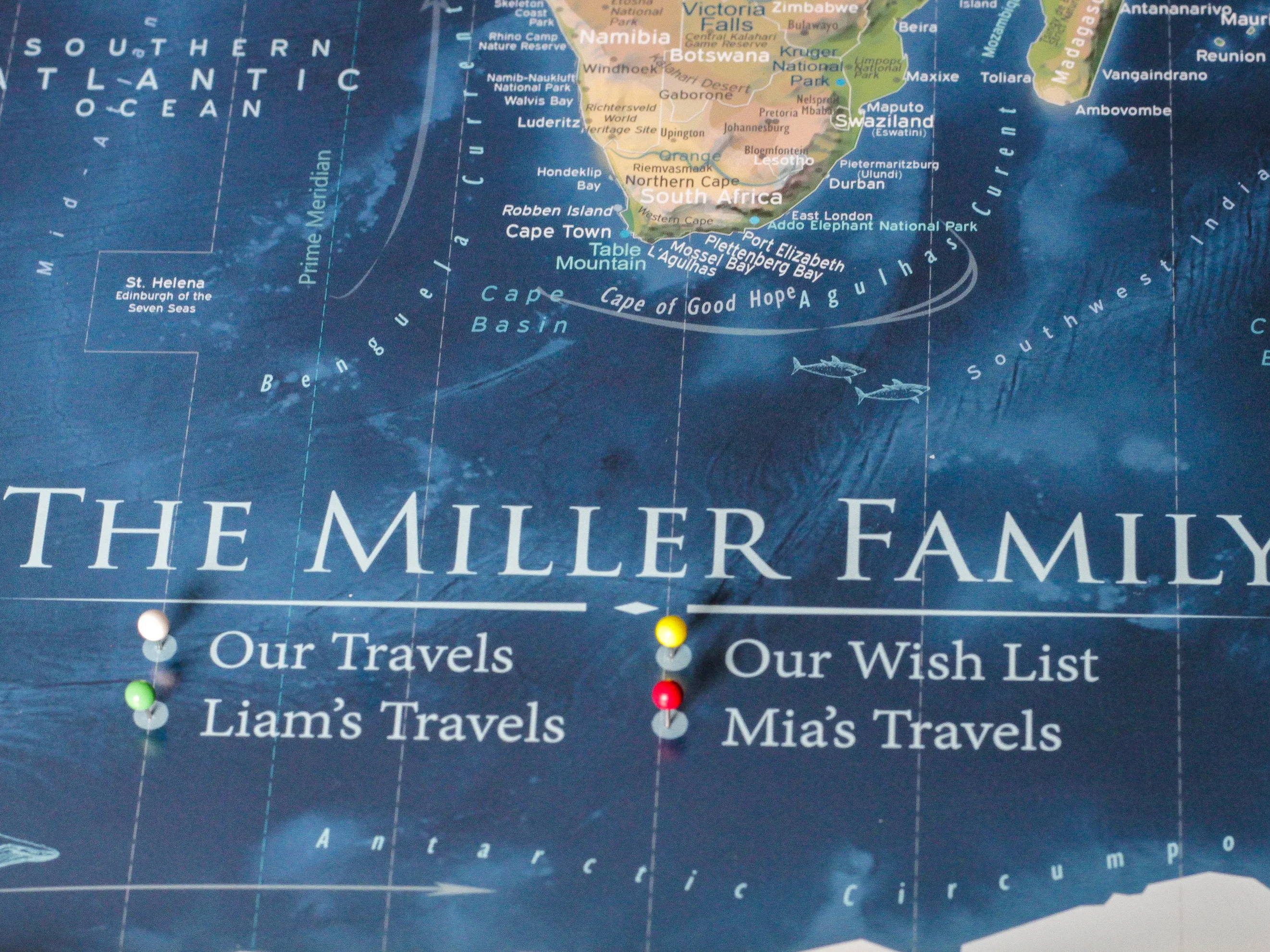 Family travels world map