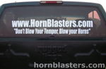 Rear tailgate view with HornBlasters decal on Winston's Silverado rear window photo 2