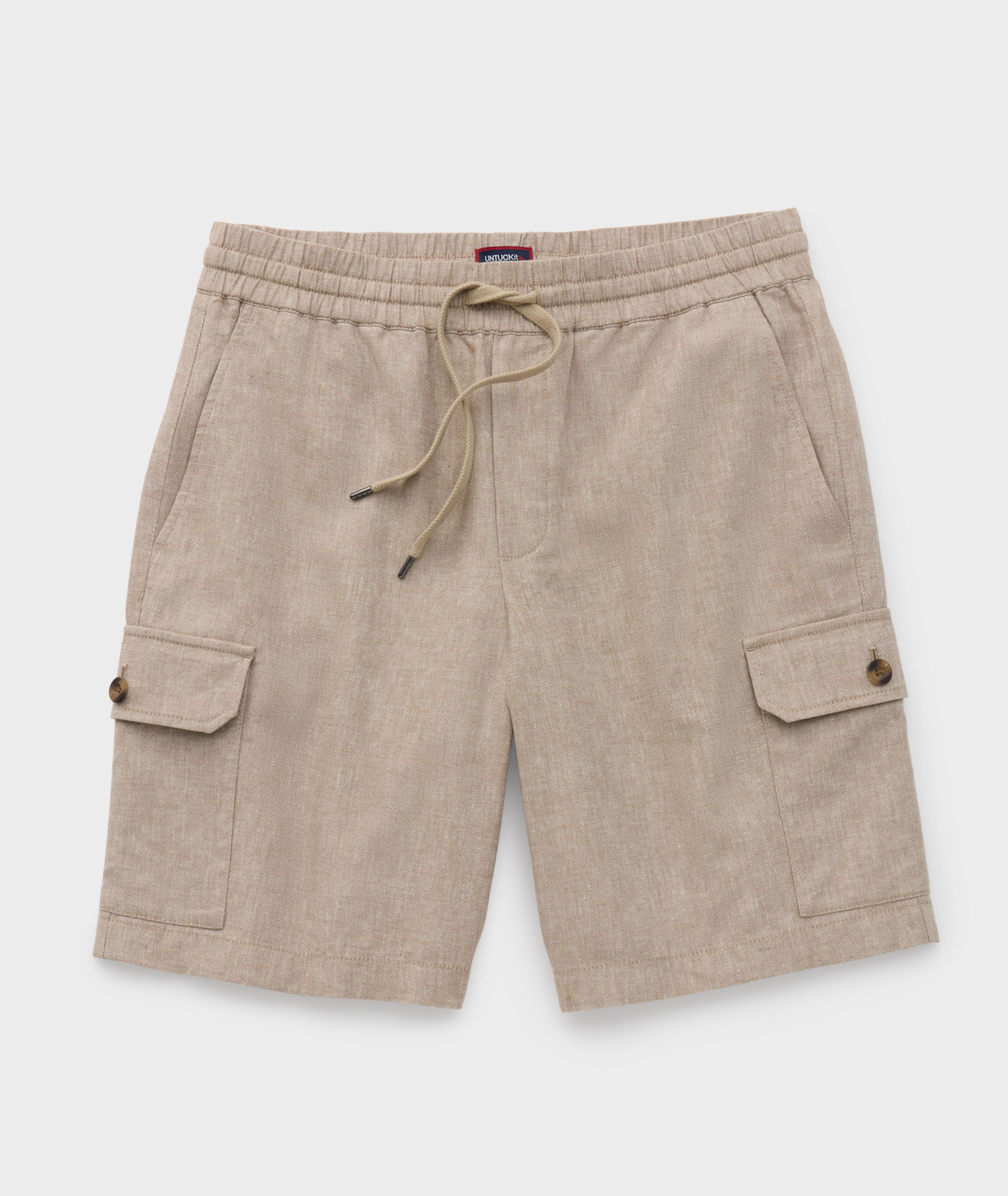 Beige cargo shorts with drawstring and side pockets.