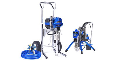 Two blue and silver machines for industrial or construction use.