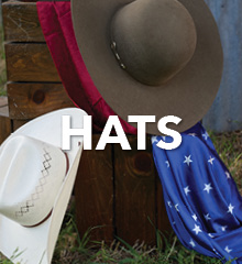 Two hats displayed with a blue star-patterned fabric and the word 