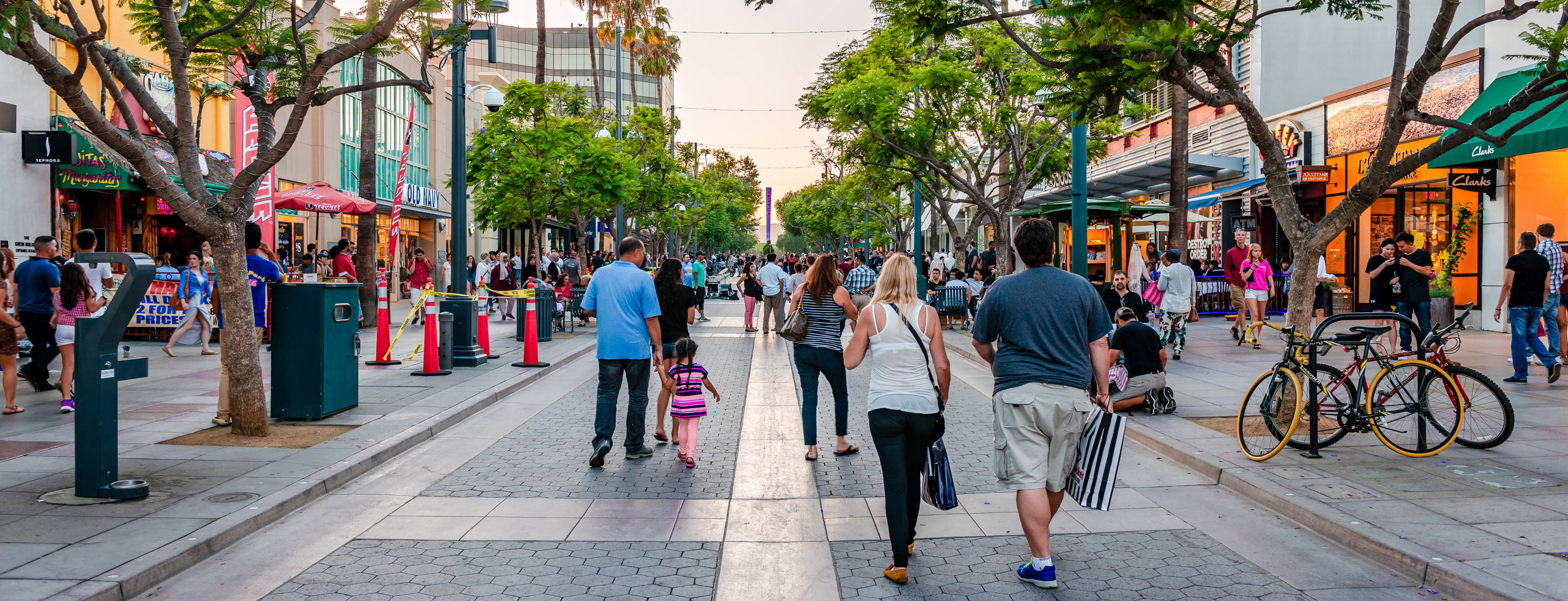 Pedestrians utilizing a shared street program.