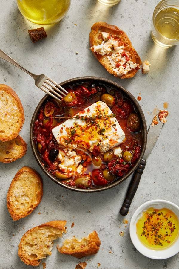 Baked feta cheese with zesty tomatoes and olives