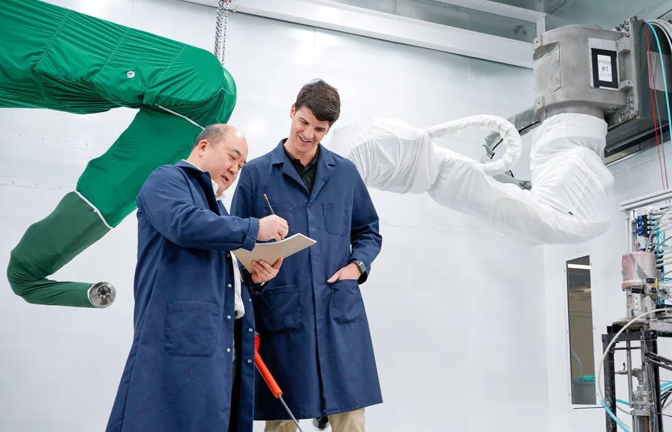 Specialty Robotic Arms with Protective Bags on Arms