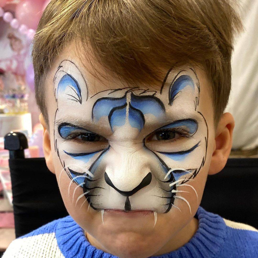 tiger face paint boy white and blue