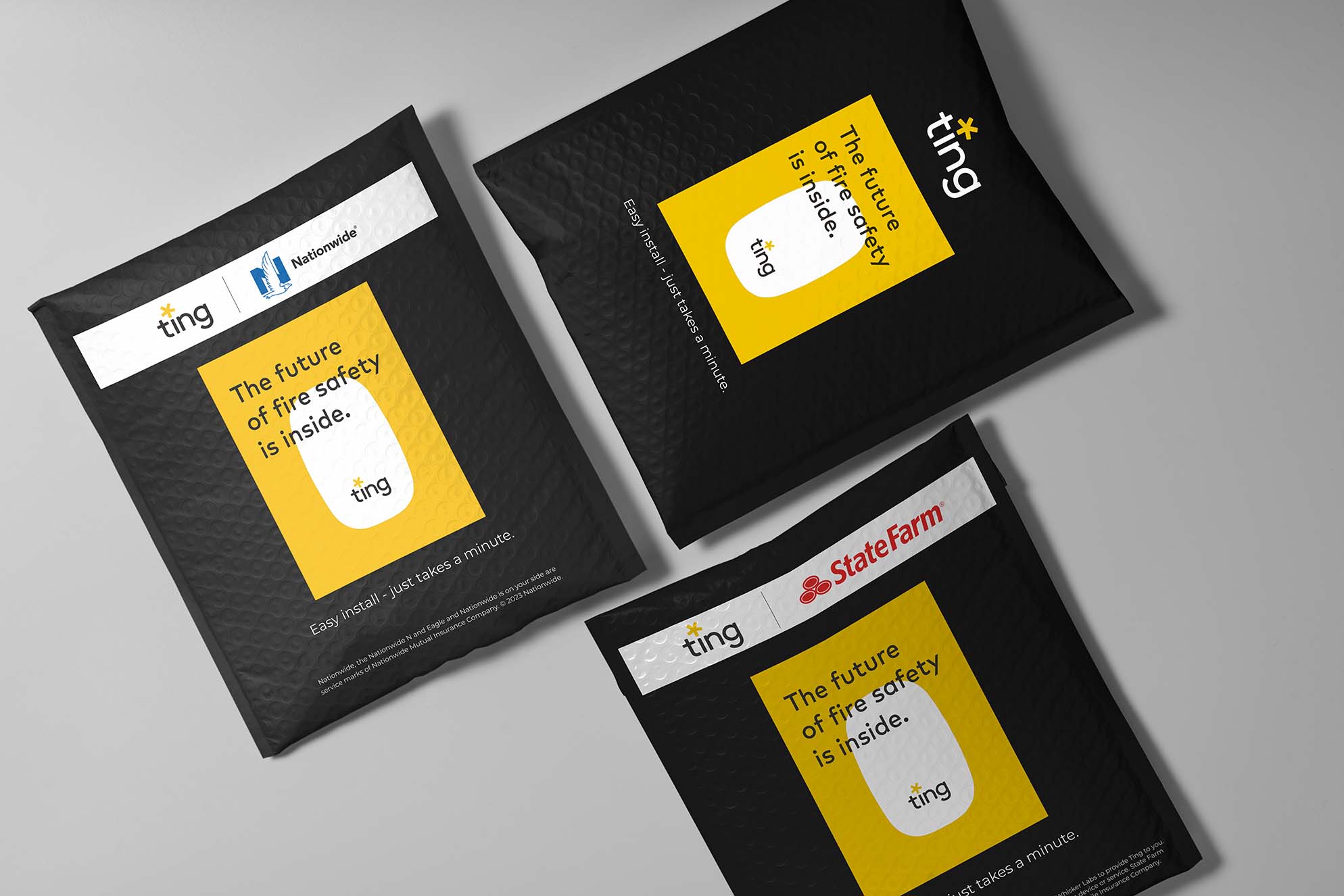 Three black packages with yellow labels, displaying product information.