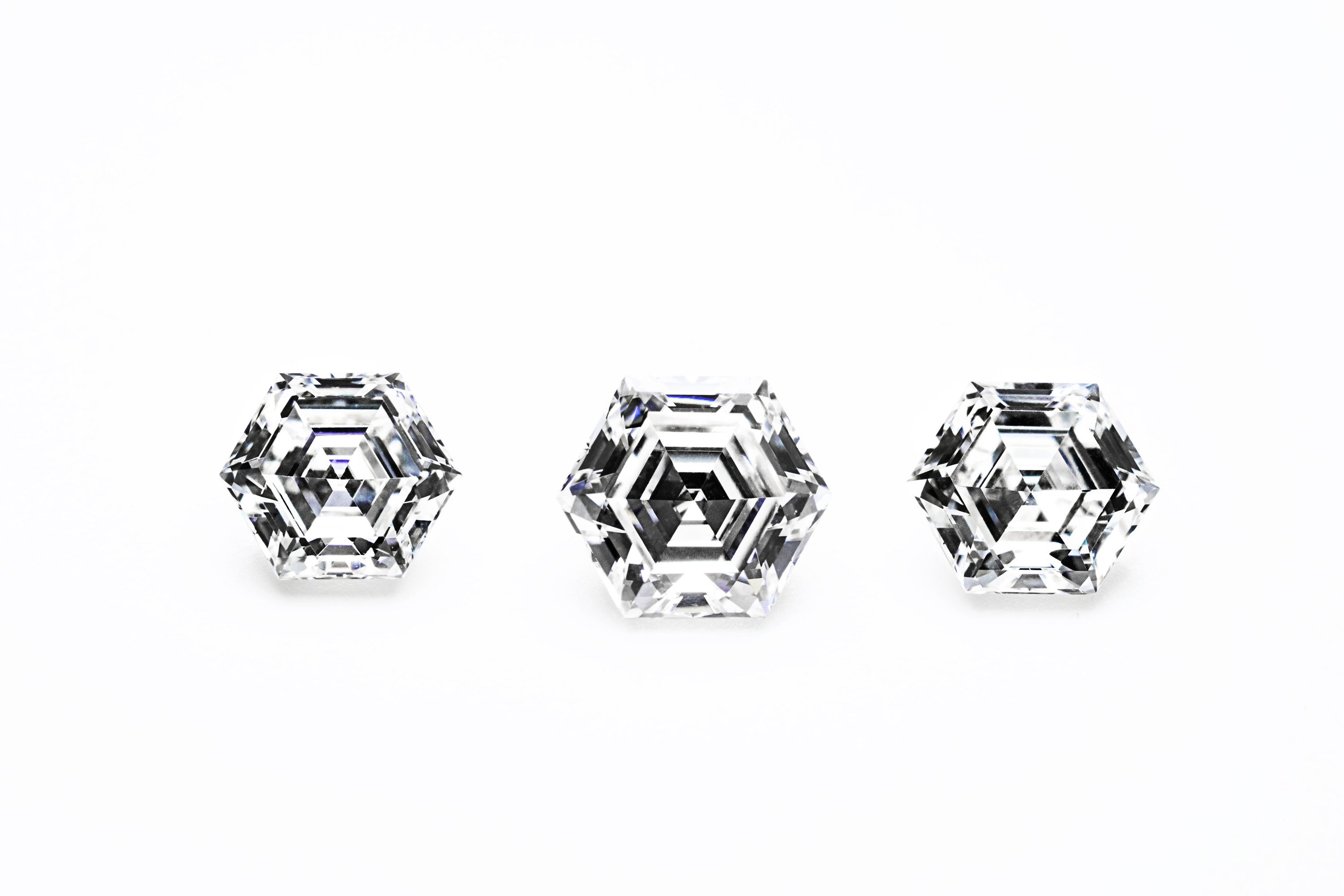 Diamond hybrid simulants and lab created diamonds