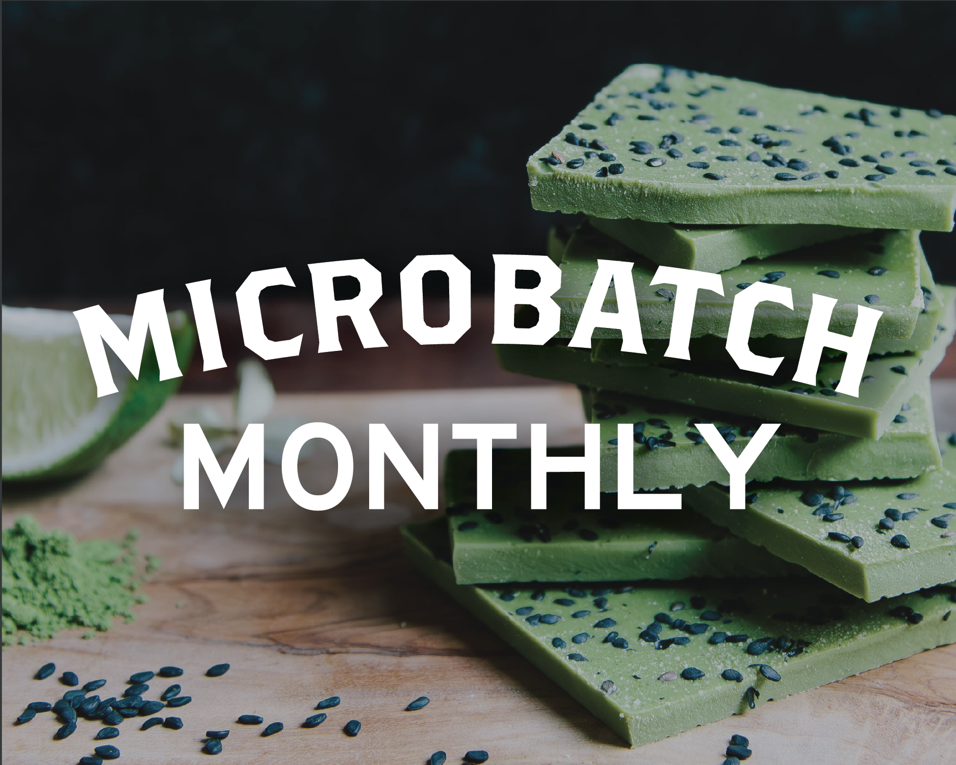 Microbatch Monthly banner, stack of matcha lime white chocolate with black sesame on a cutting board