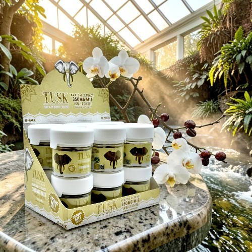 Display of skincare products in a serene botanical setting.