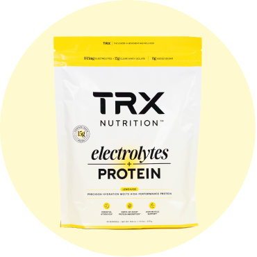 TRX Nutrition electrolytes and protein powder packaging on a yellow background.