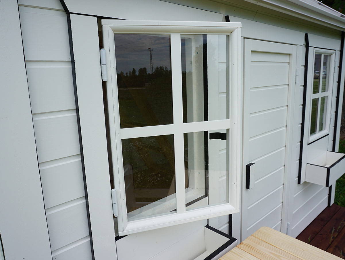 Close up of white and black Outdoor Playhouse open safety glass window by WholeWoodPlayhouses