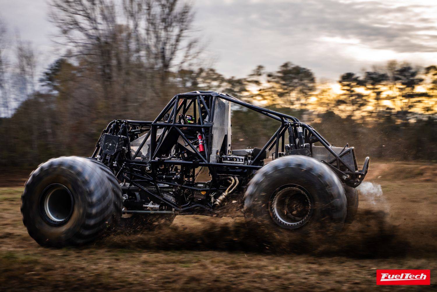 Monster truck throwing some dirt while testing FuelTech EFI.