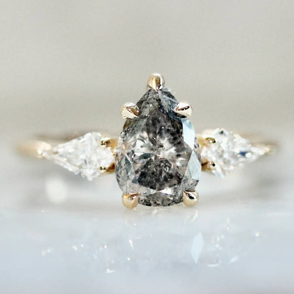 pear shaped salt and pepper diamond 3 stone engagement ring with kite side stones