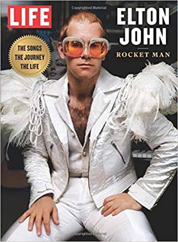 Photo of Elton John as Rocket Man on a magazine cover