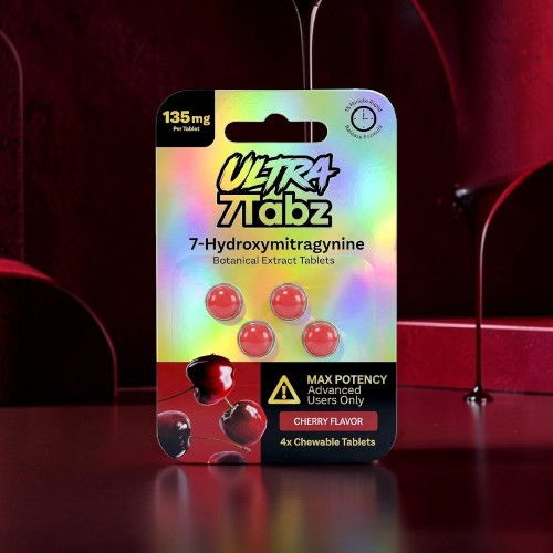 Pack of Ultra Tabz dietary supplement capsules on a colorful background.