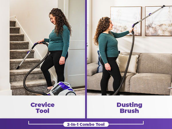 Woman using a vacuum with crevice tool and dusting brush.