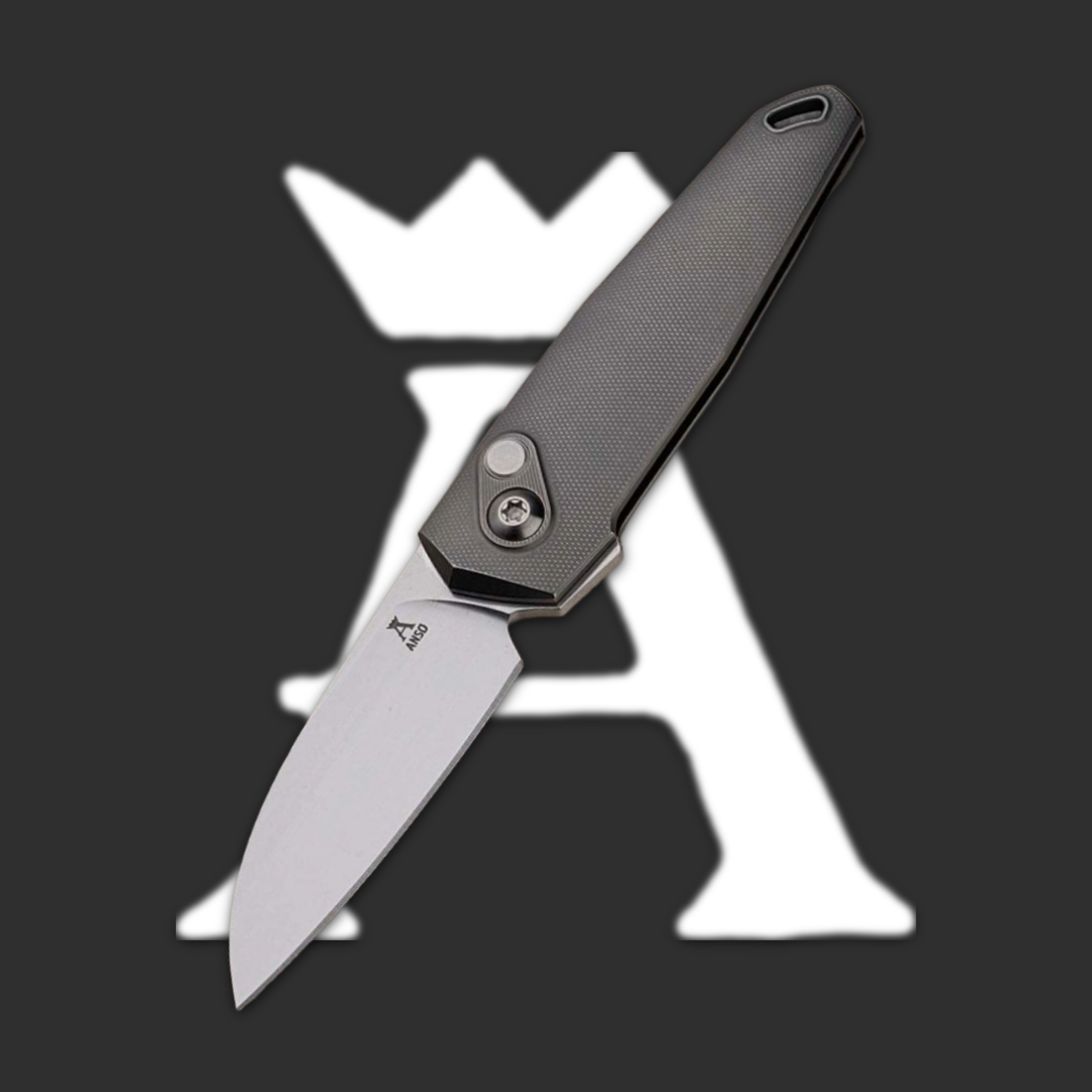 A folded knife with a gray handle against a dark background.