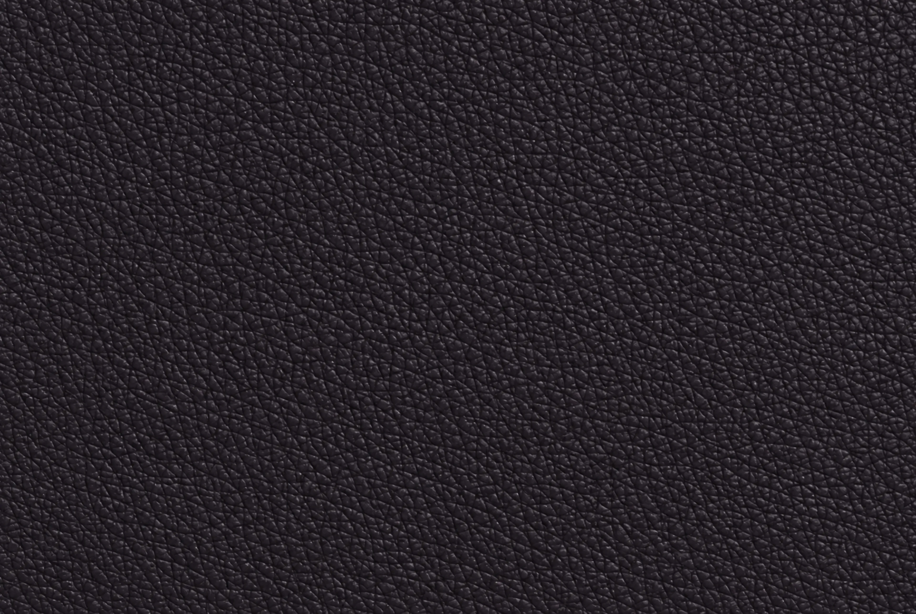 Close-up of textured dark purple material.