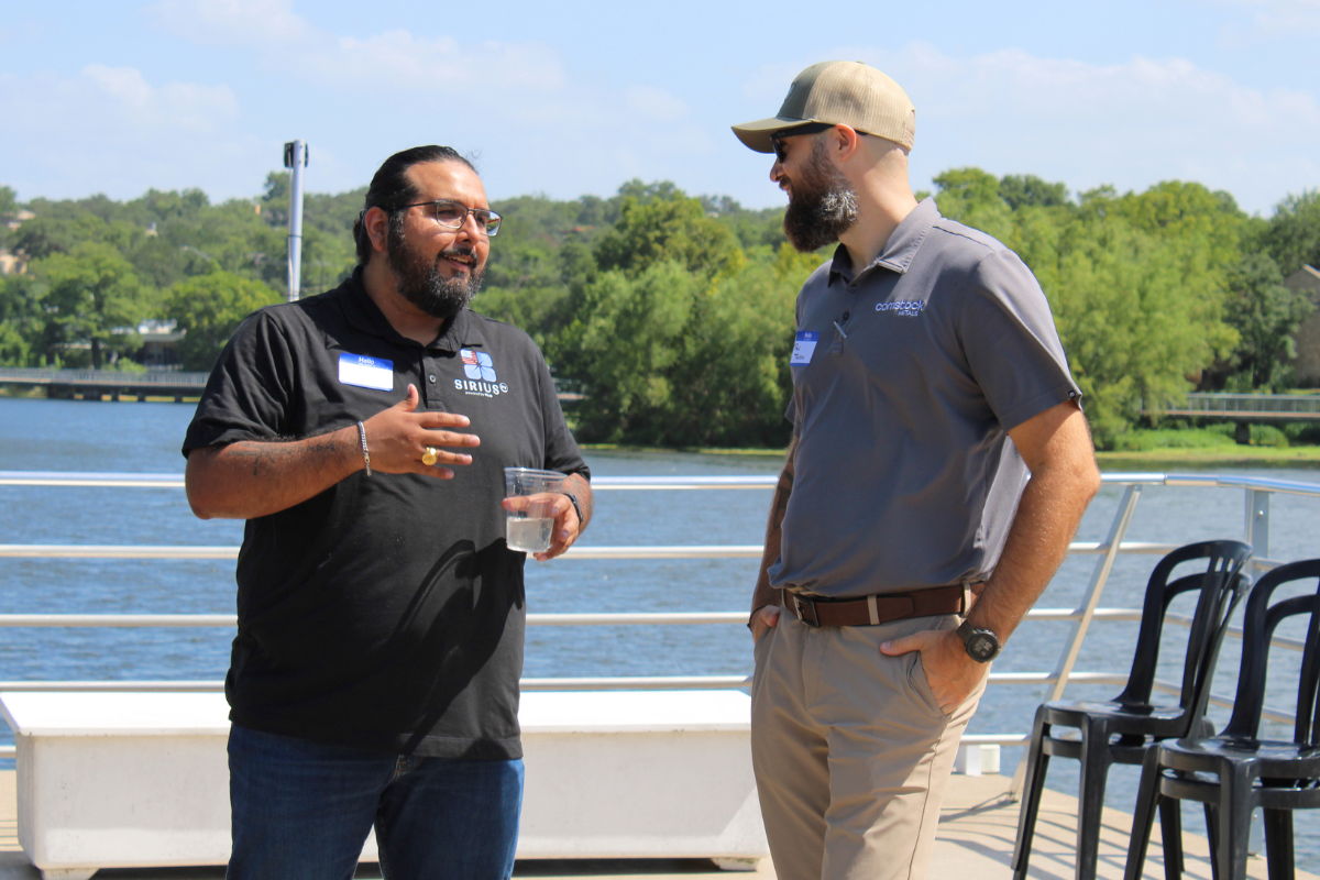 Solar professionals having a conversation on a boat in Austin