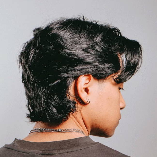 textured medium length dark hair