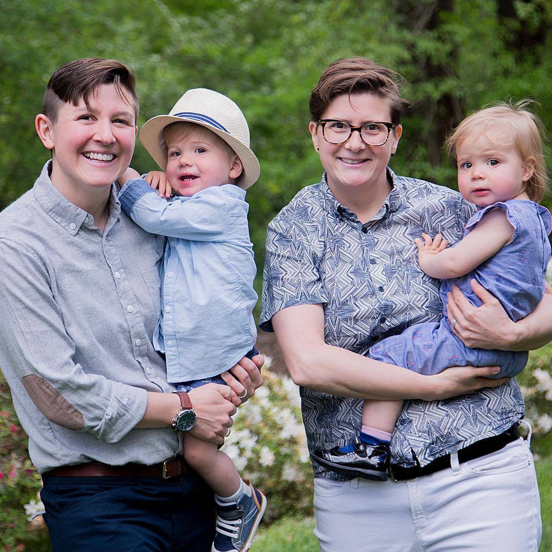 Queer parents wearing androgynous clothing 