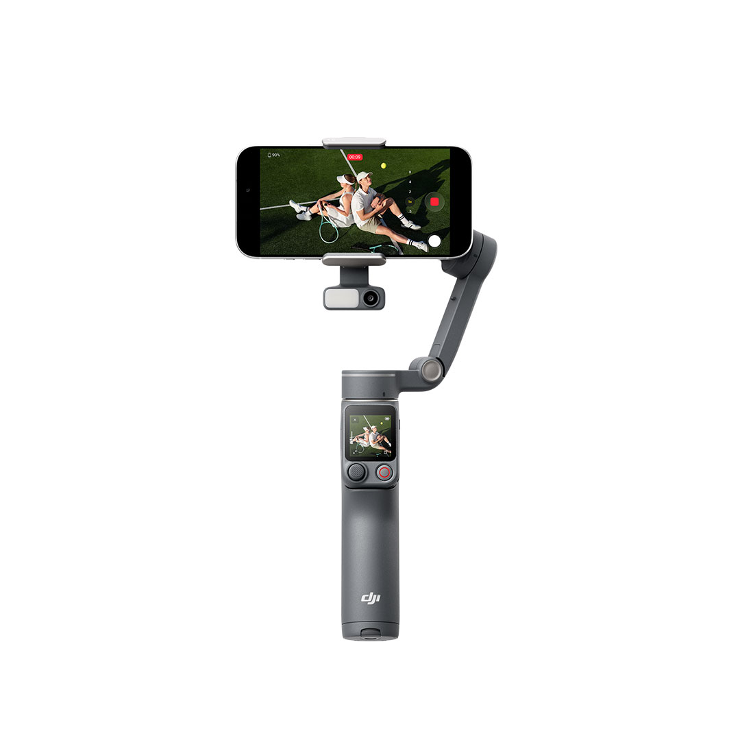 A smartphone mounted on a Osmo Mobile 8P gimbal stabilizer for smooth video recording.