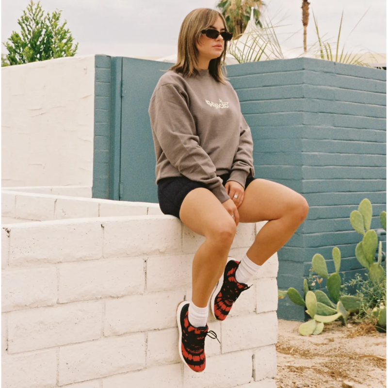 female model in no vacancy apparel and ultraboosts