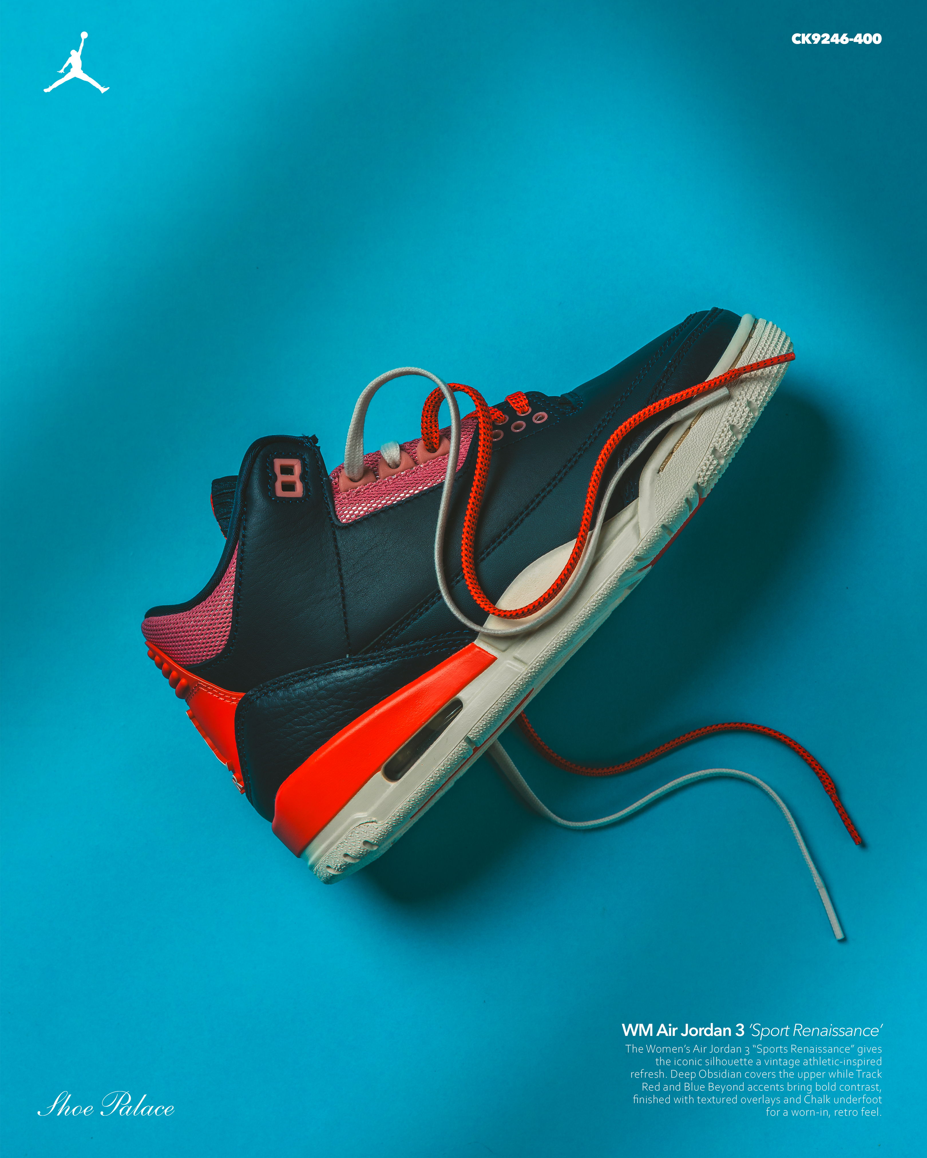 A stylish sneaker on a teal background with vibrant laces.