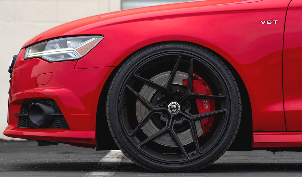 Slammed Audi A6 C7 sedan on red Alu's by