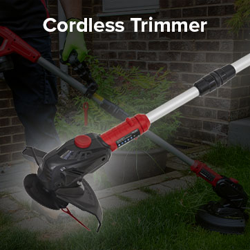 Cordless trimmer with a red and black design, used for lawn maintenance.