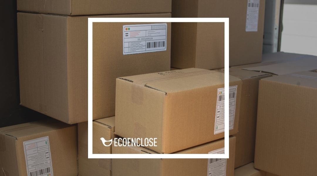 Cardboard boxes stacked in a storage area.